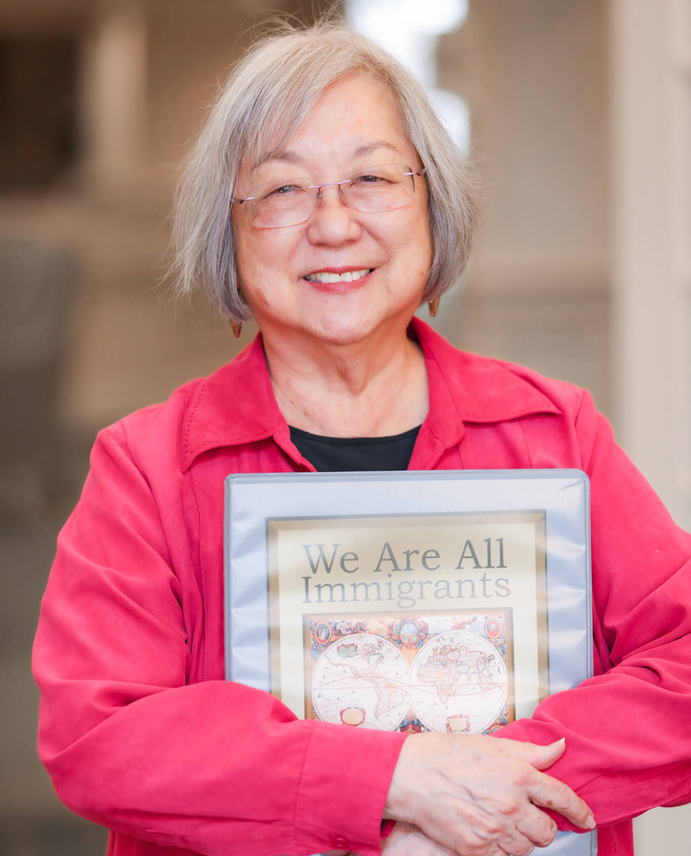 Margie Yamamoto Holding A Book