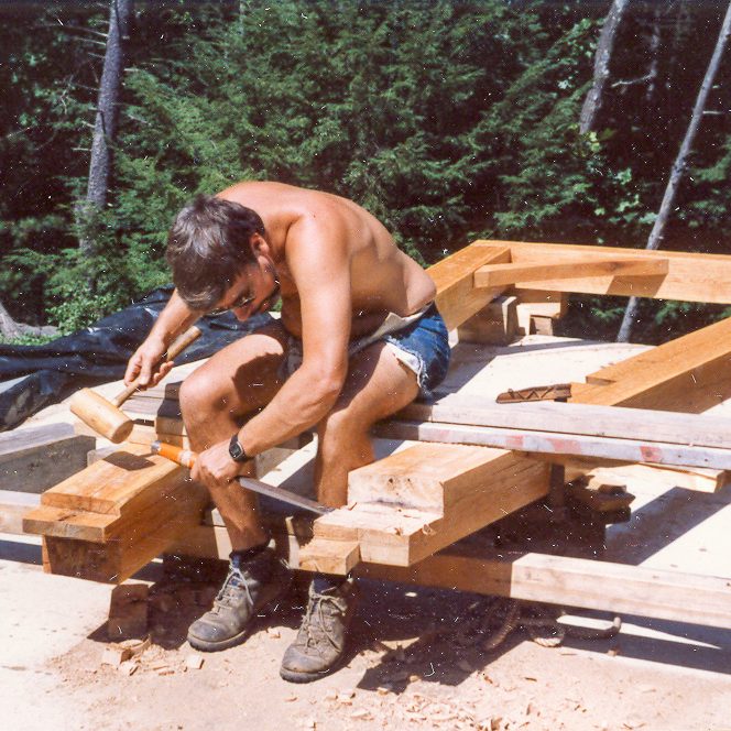 Ted Carvalho Carving a Beam