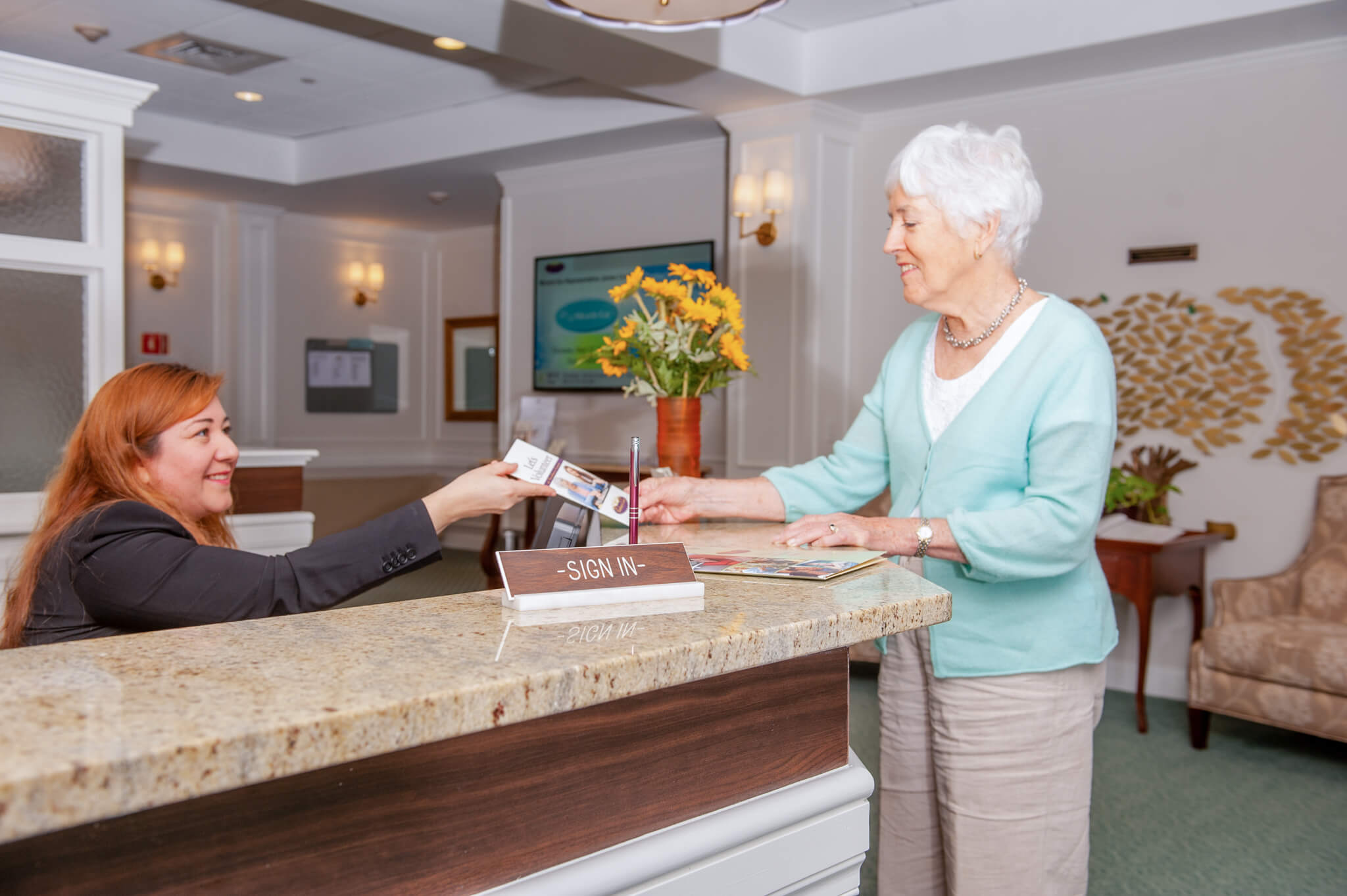 Resident at Reception Counter