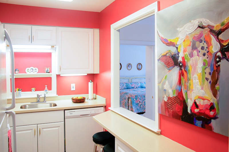 Pink Kitchen with Cow Painting